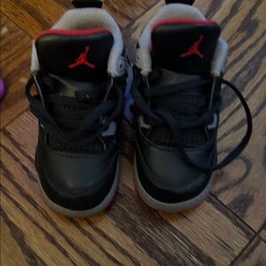 Jordan 4s Reimagined black and red Sneakers